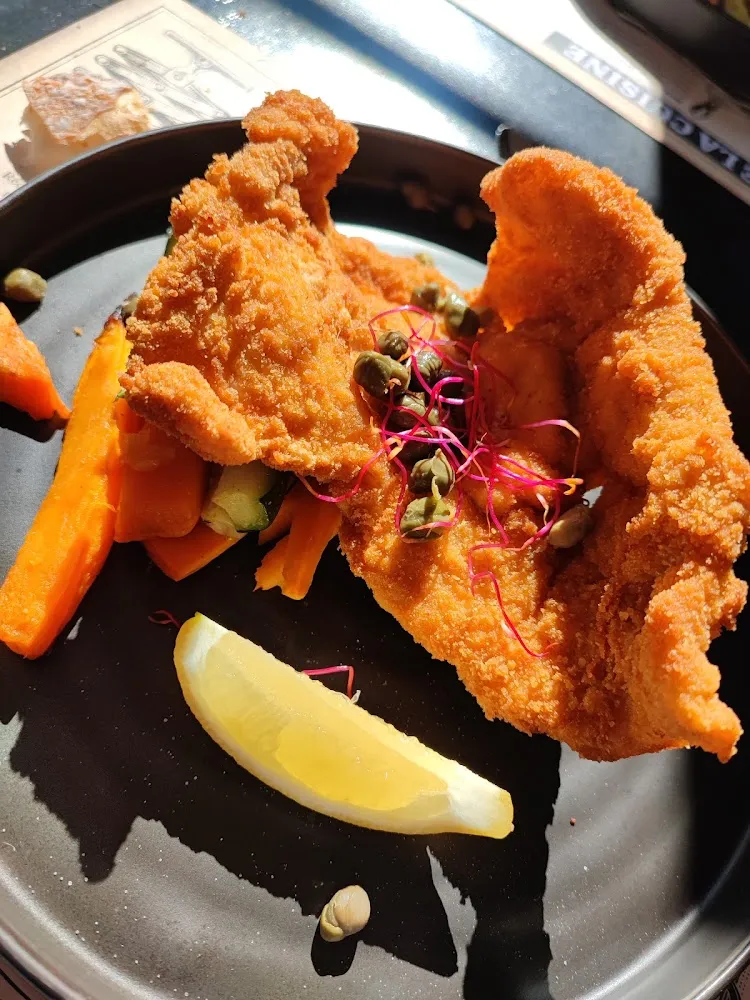 Filet de Dinde Pané Sur Un Lit de Courgettes Et Patates Douces